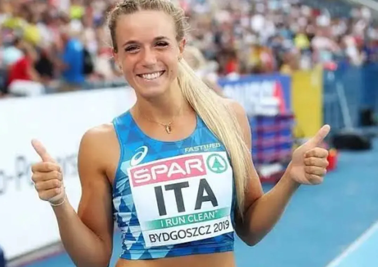 Atleta in pista come metafora di disciplina e obiettivi